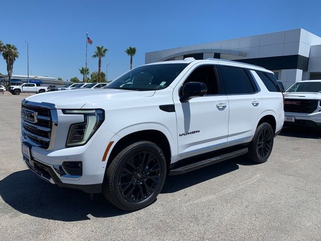 2026 GMC Yukon Elevation in Summit White — front three-quarter view