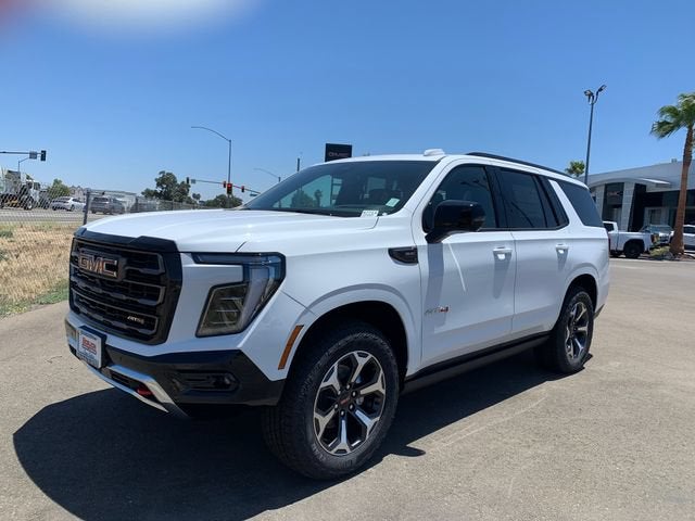2026 GMC Yukon AT4 Ultimate in Summit White — front three-quarter view