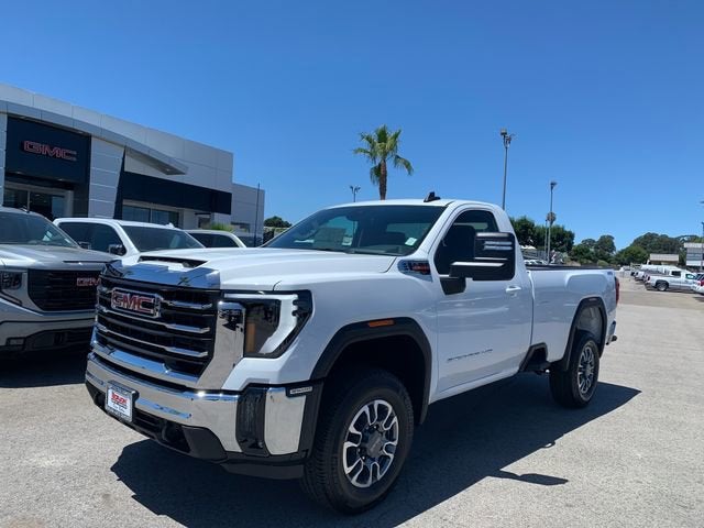 2026 GMC Sierra 3500 HD SLE in Summit White — front three-quarter view