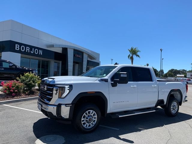 2026 GMC Sierra 2500 HD SLE in Summit White — front three-quarter view