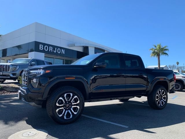 2026 GMC Canyon AT4 in Onyx Black — front three-quarter view