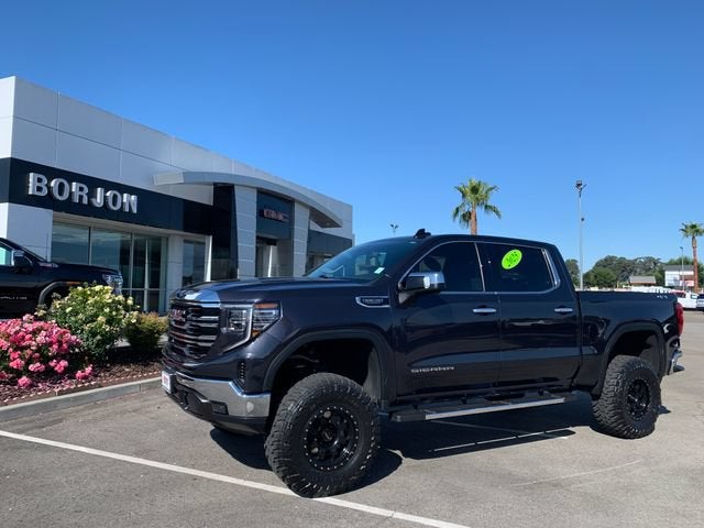 2025 GMC Sierra 1500 SLT in Titanium Rush Metallic — front three-quarter view