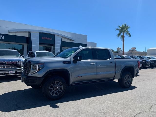 2026 GMC Sierra 1500 AT4X in Sterling Metallic — front three-quarter view