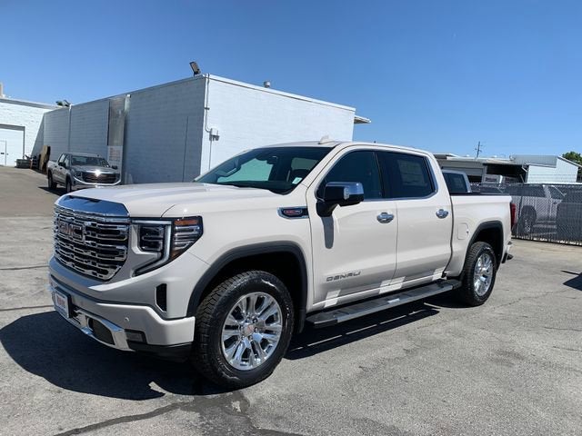 2026 GMC Sierra 1500 Denali in Coastal Dune — front three-quarter view